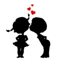 Silhouettes of kissing boy and girl