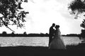 Silhouettes of a loving couple at sunset in nature Royalty Free Stock Photo