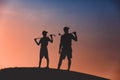 Man with his son golfers silhouette Royalty Free Stock Photo