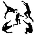 Silhouettes of men jumping Royalty Free Stock Photo