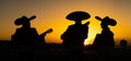 Silhouettes of a mexican musicians mariachi Royalty Free Stock Photo