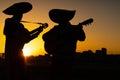 Silhouettes of a mexican musicians mariachi Royalty Free Stock Photo
