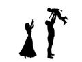 Silhouettes mother takes pictures on phone and father throws son up