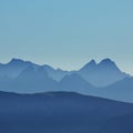 Silhouettes of mountain peaks seen from Mount Niesen.