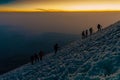 silhouettes of mountaineers at sunrise Royalty Free Stock Photo