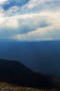 Silhouettes of mountains in the fog