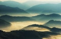 Silhouettes of mountains. A misty autumn morning. Dawn in the Carpathians Royalty Free Stock Photo