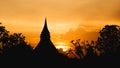 Silhouettes Pagoda sunset orange sky Royalty Free Stock Photo