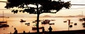 Silhouettes of people and boats in Rio de Janeiro