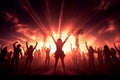 Silhouettes of people dancing joyously in front Royalty Free Stock Photo