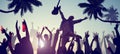 Silhouettes of People Enjoying a Concert on the Beach Royalty Free Stock Photo