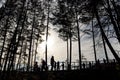 Silhouettes of people enjoying the view of Vilnia river and geological Puckoriai exposure in Vilnius, the highest exposure in Royalty Free Stock Photo