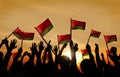 Silhouettes of People Holding Flag of Belarus Royalty Free Stock Photo