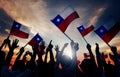 Silhouettes of People Holding Flag of Chile