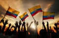Silhouettes of People Holding Flag of Ecuador Royalty Free Stock Photo