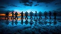 Teamwork, unity and collaboration are illustrated by silhouettes of people holding puzzle pieces together on the beach at dusk Royalty Free Stock Photo