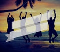 Silhouettes of People Jumping by the Sea Royalty Free Stock Photo