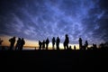 silhouettes people on mountainin sunrise time