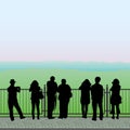 Silhouettes of people on the observation deck