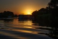 Tourists on vacation on a boat at sunset