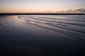 Silhouettes of people on evening Beach