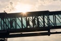 Silhouettes of people walking at busy airport Royalty Free Stock Photo