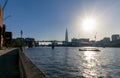 Silhouettes of people walking on the Millennium Bridge in London Royalty Free Stock Photo