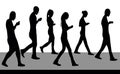 Silhouettes of people walking and with phones