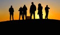 Silhouettes of people on warm colorful sunset in Belgrade, Serbia