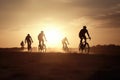 Silhouettes of professional cyclists on road at sunset. Generative AI