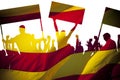 Silhouettes of protesting people against the the flag of Barcelona on white background. Isolated.