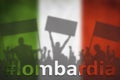 Silhouettes of protesting people against the the flag of Italy with hashtag Lombardia