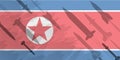 Silhouettes of rocket against the background of the flag of North Korea. Military background. Conflict in Asia.