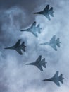 Silhouettes of russian fighter aircrafts SU-27 in the sky