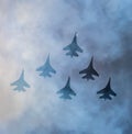 Silhouettes of russian fighter aircrafts SU-27 in the sky