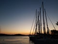 Silhouettes of sail poles at sun set Royalty Free Stock Photo