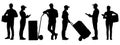 Silhouettes set of warehouse workers holding boxes with a clipboard. Delivery man and woman with cargo carts