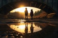 Silhouettes of small children walking under a bridge Royalty Free Stock Photo