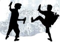 Silhouettes of taggers drawing graffiti Royalty Free Stock Photo