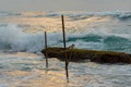 Silhouettes of the traditional Sri Lankan stilt fishermen on a stormy in Koggala, Sri Lanka. Stilt fishing is a method of fishing