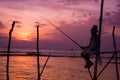 Silhouettes of the traditional Sri Lankan stilt fishermen