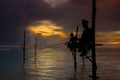 Silhouettes of the traditional Sri Lankan stilt fishermen