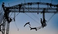 Silhouettes of trapeze artists acrobats