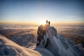Silhouettes of two climbers on the top of a mountain Royalty Free Stock Photo
