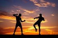 Silhouettes of two fighters Royalty Free Stock Photo