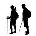 Silhouettes of two hikers with backpacks Royalty Free Stock Photo