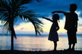 Silhouettes of two kids Royalty Free Stock Photo