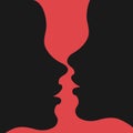 Silhouettes of two kissing women. Lesbian couple kissing