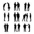 Silhouettes of two men interacting with each other Royalty Free Stock Photo