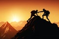 Silhouettes of two people climbing on mountain and helping each other Royalty Free Stock Photo
